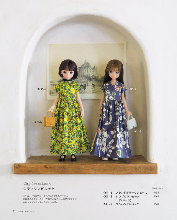 00024 Two dolls in yellow and navy floral dresses with mini bags, a city doll dress pattern look.