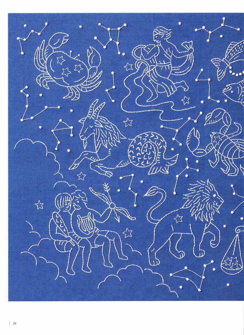 1505-09042026220514_022 Yumiko Higuchi's zodiac embroidery patterns in white on cobalt blue — lion, crab, bull and twins.