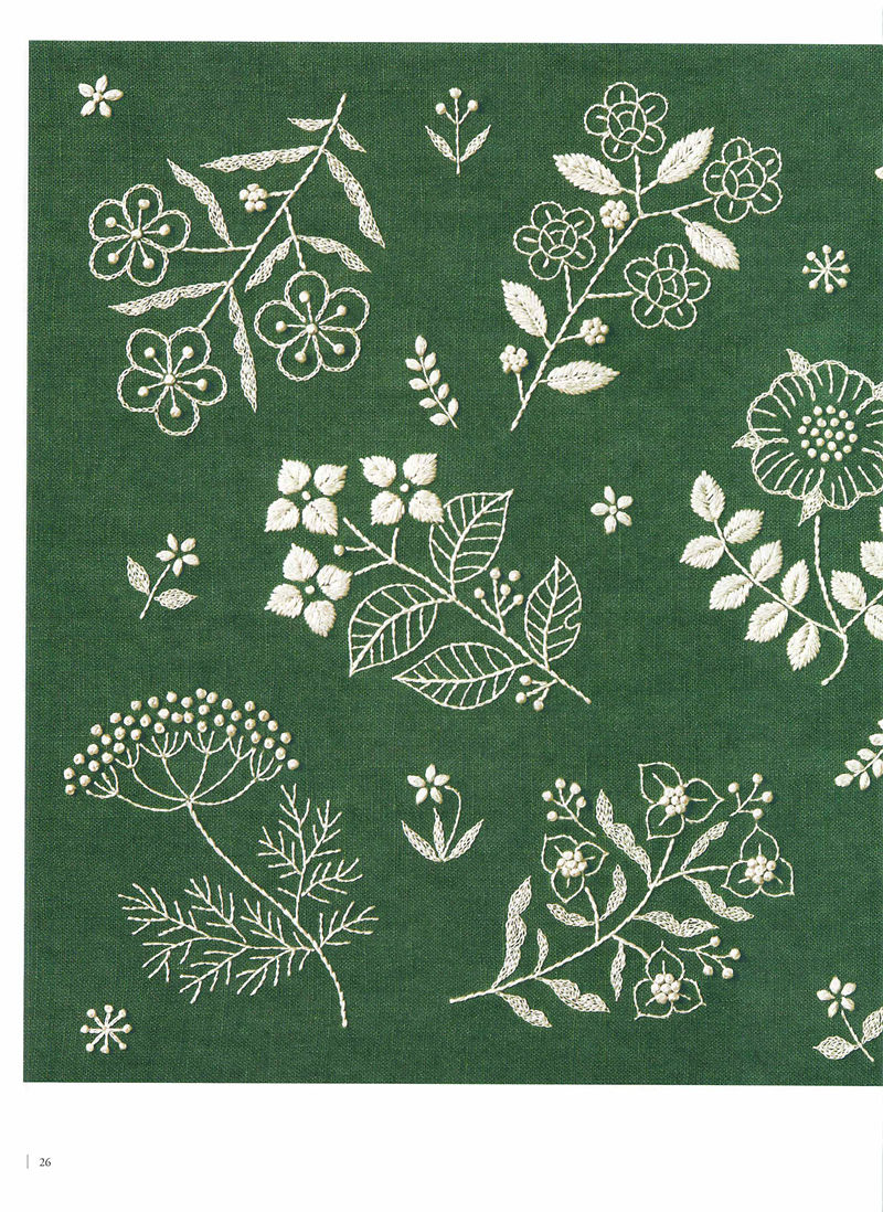 1505-09042026220514_028 Botanical embroidery motifs by Yumiko Higuchi — white sprigs, clover and berries on green linen.