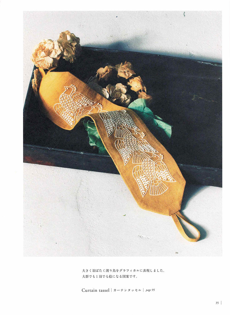 1505-09042026220514_037 Yumiko Higuchi's embroidered curtain tassel in gold thread, styled with dried flowers.