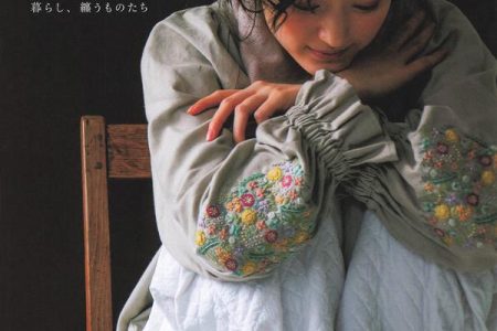 Cover of a Japanese embroidery pattern book by yula, showing a linen smock blouse with wildflower-embroidered sleeves.