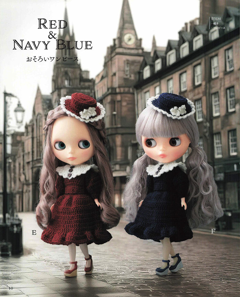 1492-04232026184101_012 Matching crochet doll dress patterns in red and navy with white lace collars and tiny brimmed hats on a rainy street