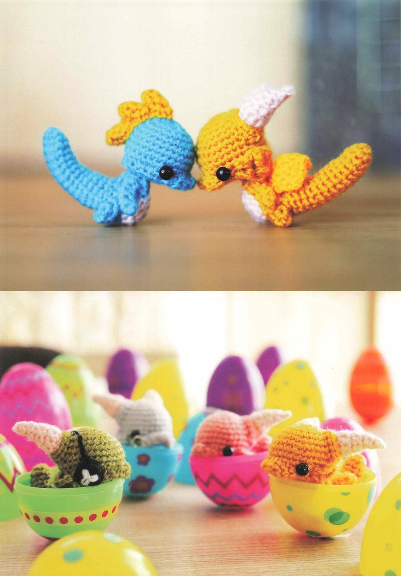 1495-04232026184535_015 Blue and yellow crochet dragons with pastel Easter eggs, a springtime amigurumi scene
