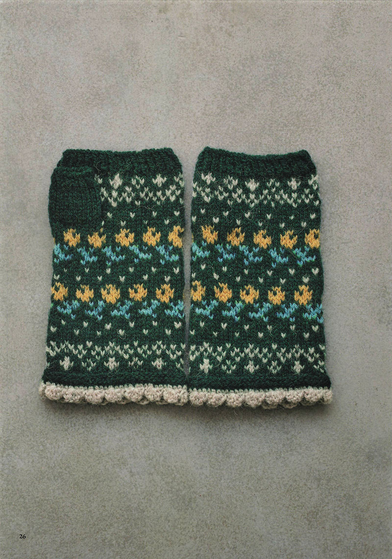 1496-20260309135601_027 Dark green knitted gloves with yellow and turquoise tulips and tiny white sprigs, a cheerful colorwork pattern