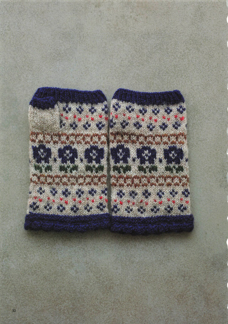 1496-20260309135601_033 Cream colorwork knitting pattern with navy flowers, orange dots and brown stripe bands on fingerless gloves