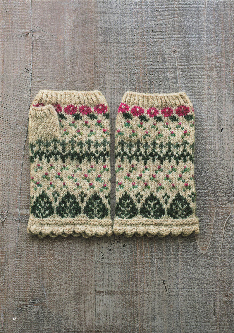 1496-20260309135601_049 Cream knit fingerless gloves with pink flower tops over dark green leaf motifs and a scalloped hem
