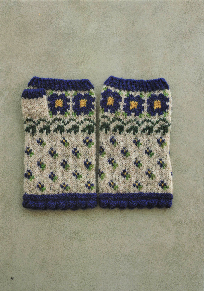 1496-20260309135601_099 Navy and yellow flower squares on cream knitted mitts with green sprigs and a navy scalloped hem