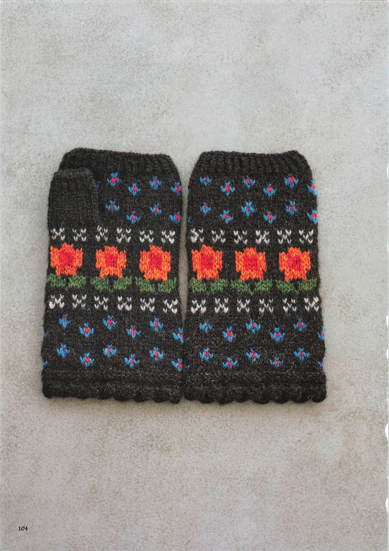 1496-20260309135601_105 Orange poppy knit gloves on charcoal with blue forget-me-nots, a floral colorwork pattern